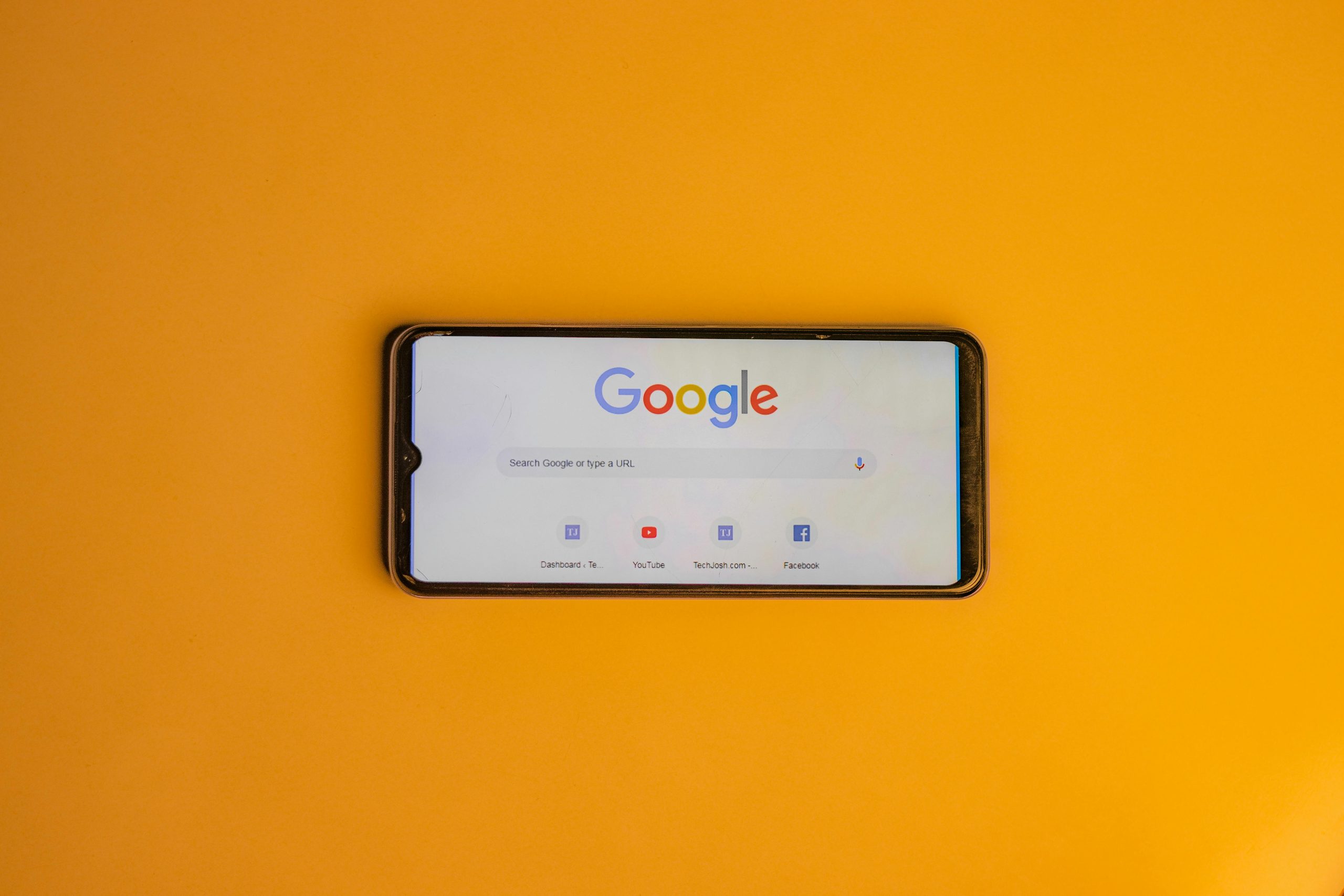 smart-phone-with-a-google-search-page-on-its-display-stockpack-pexels Smart phone with a google search page on its display